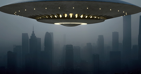 As the eerie mist blanketed the city, a mysterious object materialized above, defying all conventional understanding. A UFO, bathed in ethereal lights, suspended itself in the fog, silently surveying the urban landscape below.
