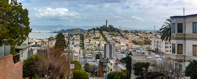 Panoramic view of Lombard Street which is a street in San Francisco, California, United States. Steep street with many slopes and Californian hills. America Concept.