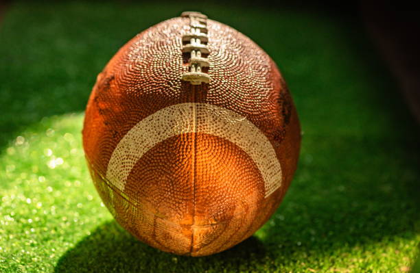 istock American football ball texture as background 1498107995