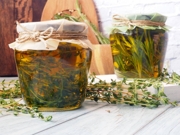 istock Olive oil with thyme and rosemary 1498109324
