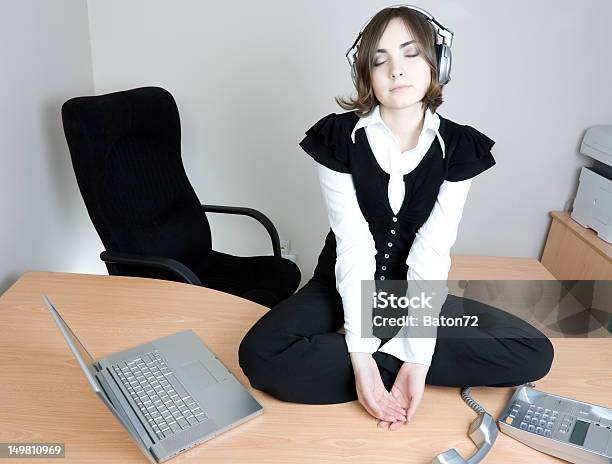 Young Businesswoman Sitting On The Desk Stock Photo - Download Image Now - Adult, Beautiful People, Beauty