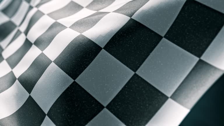 Waving Racing finish flag with checkered pattern texture in slow motion