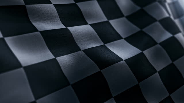 Waving Racing finish flag with checkered pattern texture in slow motion