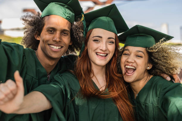 istock multiracial classmates at graduation party selfie 1498113698