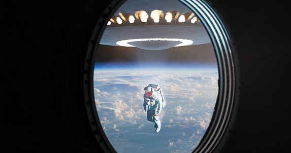 Through the spacecraft's porthole, a chilling scene unfolds as an astronaut is unexpectedly abducted by a UFO. The window, designed to offer a view of the cosmos, becomes a witness to this eerie encounter. The illuminated view from the spacecraft's window captures the harrowing moment as the astronaut is taken by the unidentified flying object, leaving behind an unsettling sense of mystery