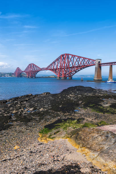 istock Forth Bridge From Queensferry Shore In Scotland 1498115678