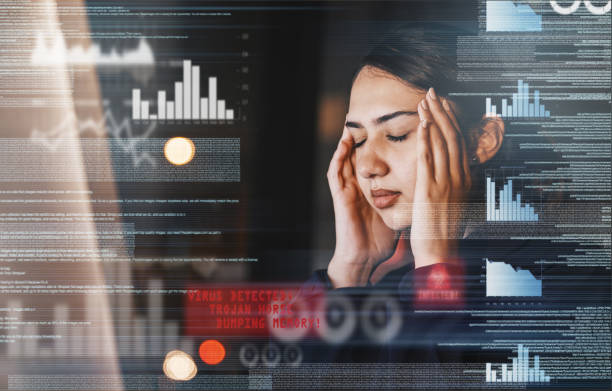 istock Stats, digital and woman with a headache and computer while working in investment at night. Stress, burnout and stock market employee tired and frustrated with data problem on a pc during overtime 1498115685