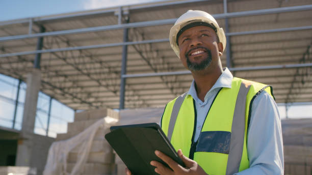 istock Man, construction and tablet at site for project management, building logistics or app. Male person and engineering worker on digital technology at industrial architecture design 1498116365