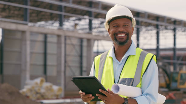 istock Man, construction and tablet at site for project management, building logistics or app. Male person and engineering worker on digital technology at industrial architecture design 1498116393