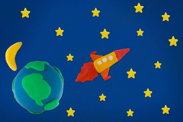 istock rocket made from plasticine on space earth moon and star background 1498123537