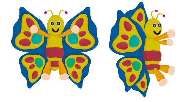 istock colorful cartoon smile butterfly made from plasticine on white 1498123910