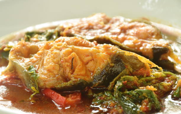 istock spicy fried catfish with basil and chili in curry 1498129885