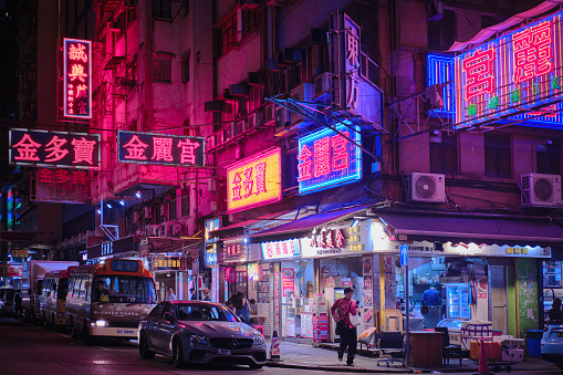 Mong Kok, Hong Kong - April 12 2023: View of night streets, neon signboards of stores