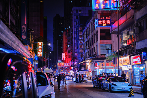Mong Kok, Hong Kong - April 12 2023: View of night streets, neon signboards of stores
