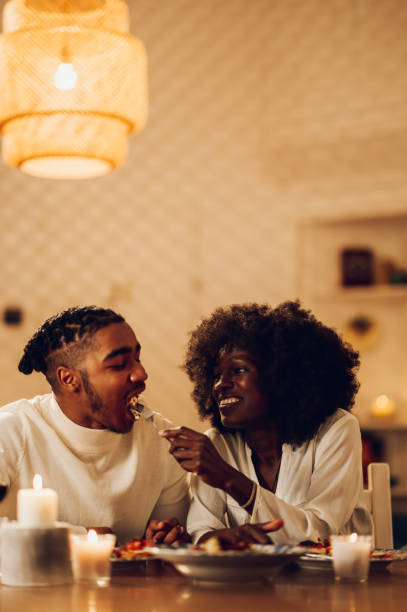 istock African american couple having romantic dinner date at home 1498139687