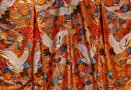 Close-up on kimono textile for sale. The fabrics that kimono are made from are classified in two categories within Japan: Gofuku is the term used to indicate silk kimono fabrics and Futomono used for Cotton and hemp fabrics.