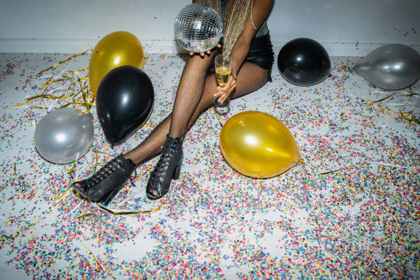 istock A woman holding disco ball 1498142203
