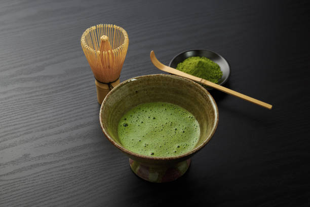 Japanese traditional matcha tea on wood background