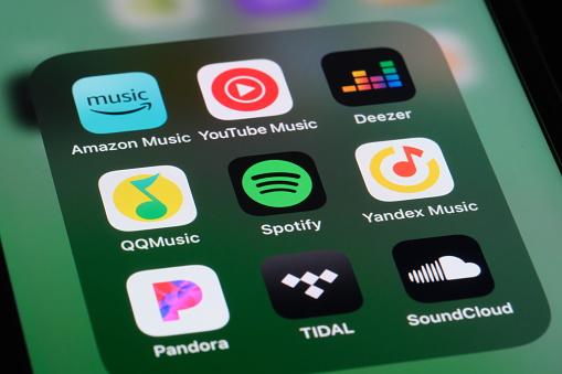 Shanghai,China-June 13st 2023: Spotify,QQ Music,Amazon music,Pandora,Youtube music,Deezer,Yandex music,TIDAL and SoundCloud app icon on screen. Assorted online Music streaming service brands