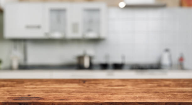 istock beautiful defocused kitchen with a wooden bar table 1498145606
