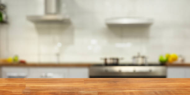 istock beautiful well tidy and clean kitchen defocused with a table in focus 1498146809