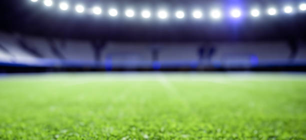 istock beautiful soccer field grass with defocused background 1498146977