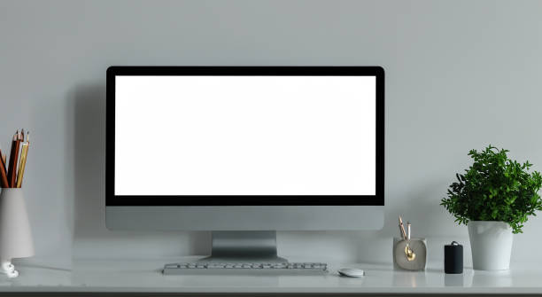 istock beautiful white screen computer on top of a desk 1498147094