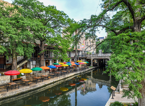 San Antonio River Walk restaurant with parasols
