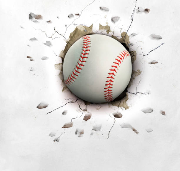 istock A baseball hits through a cement wall. concept of strength 1498158840