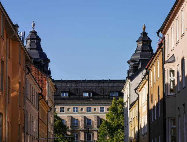 istock Low angle view of buildings against clear blue sky 1498159870