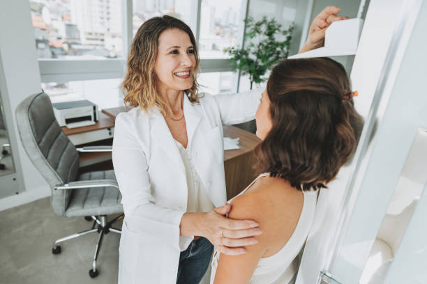 istock Woman measuring height at doctor's office 1498161176