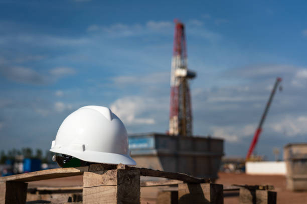 istock Oilfield worker safety hardhat. 1498162196