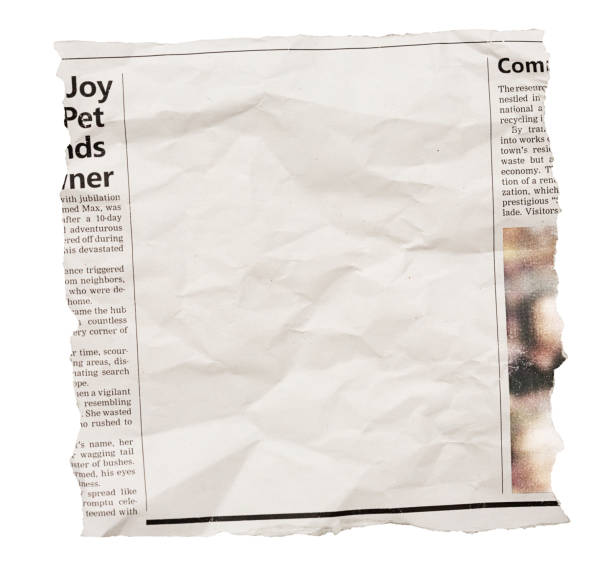 istock Crumpled newspaper clipping with blank space for your copy 1498163901