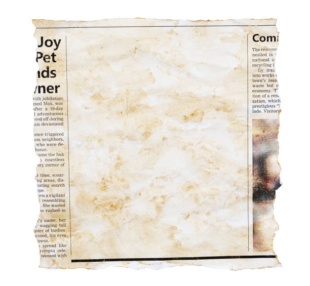istock Stained old newspaper clipping with blank space for your copy 1498164033