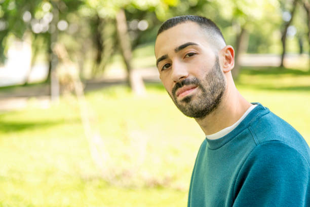 istock Young bearded man captivated in a natural park 1498167040
