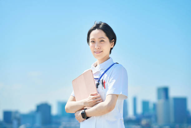 istock A woman in a white coat with a file 1498168824