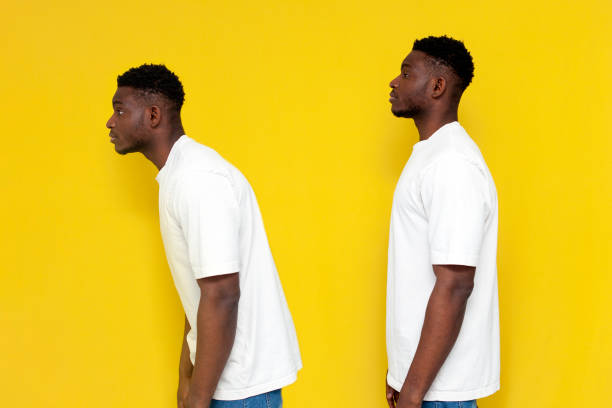 istock concept of bad posture and back problems. african american man stands upright and hunchback 1498169280