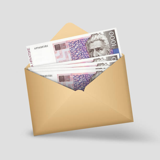 istock Croatian kuna notes inside an open brown envelope. 3D illustration of money in an open envelope 1498171464