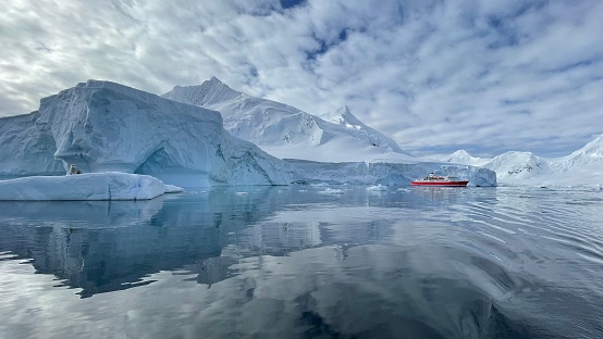 The Gullet, Antarctica - February, 25, 2023:  Anchored in The Gullet, the expedition teams explore via zodiac.  The famed Gullet is at the center of a  crisscrossing, ‘X’-shaped ice-bound narrow channel that stretches 11 nautical miles and is a shortcut between Marguerite Bay and the north.