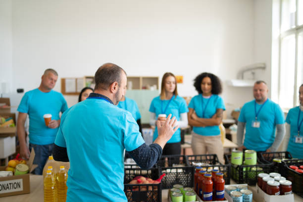 istock Volunteers having a team meeting in charitable foundation 1498174730