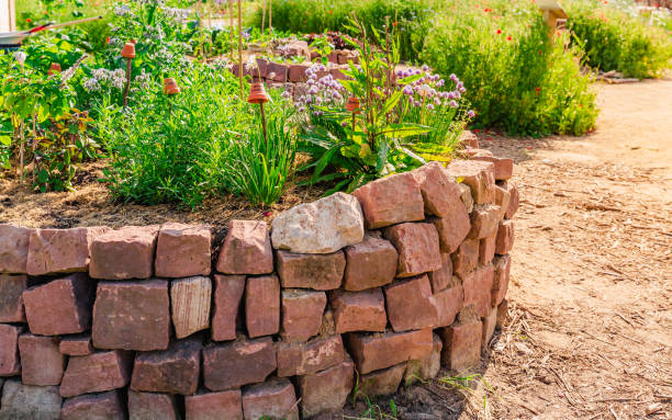 istock Herb spiral made of bricks for a small garden. 1498175172