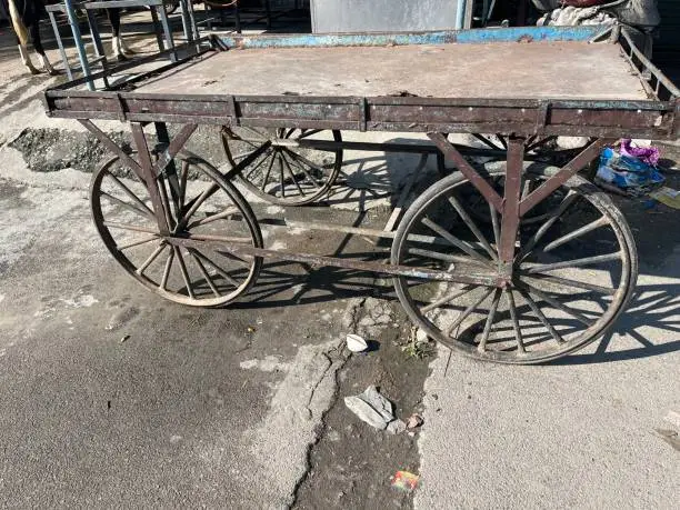 Photo of Movable counter by the side of the road on the streets of india that will be used to sell fruits and vegetables or different fast street foods