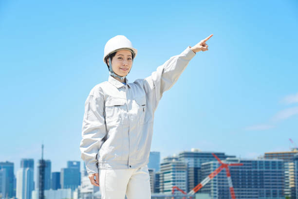 istock A woman in work clothes doing a positive pose 1498177835