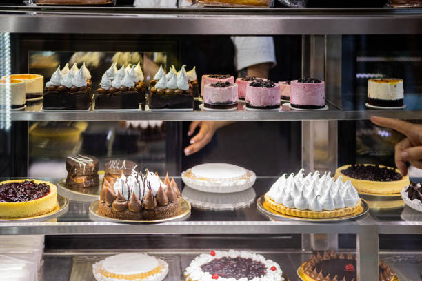 istock Senior woman at a bakery store 1498178865