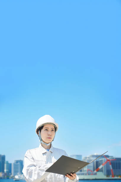 istock A woman in work clothes checking the site 1498178886