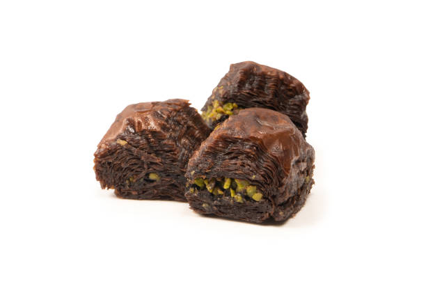 istock Turkish chocolate baklava isolated on white background. 1498181122