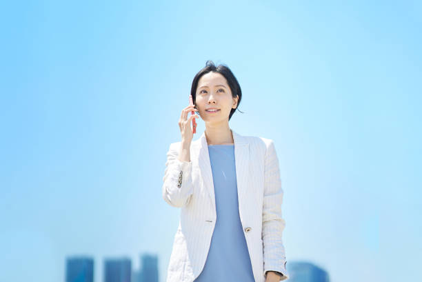 istock business woman talking on smartphone 1498181790