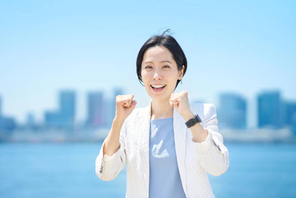 istock Business woman cheering with a smile 1498183364