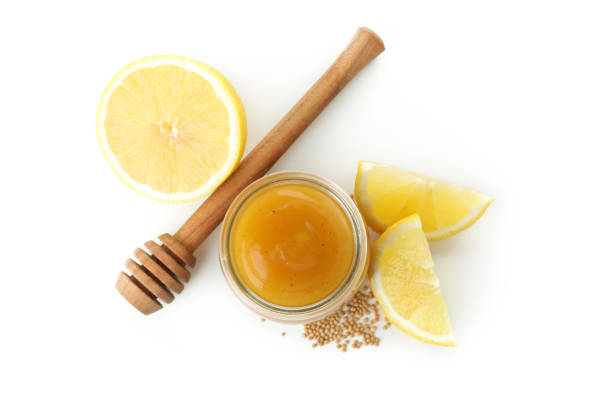 istock Mustard honey sauce isolated on white background 1498184468