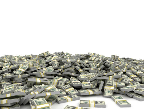 istock Large group of US dollar bundles on white background 1498185017